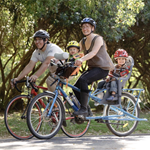 family of four riding bikes