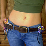 girl wearing toolbelt with floral tools and middrift showing