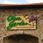 front of an olive garden restaurant