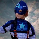 child dressed as captain america with sunburst in background