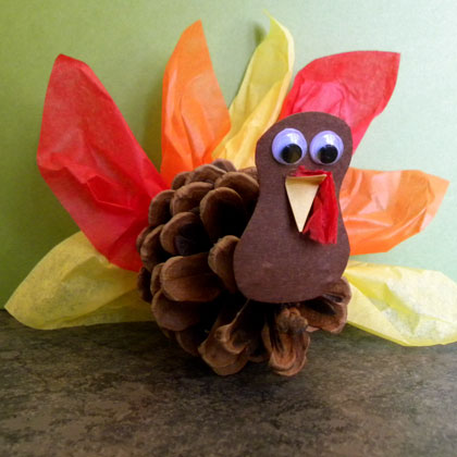 turkey made from tissue paper and a pine cone